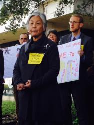 Satsuki Ina speaks to press before testifying against the licensing.